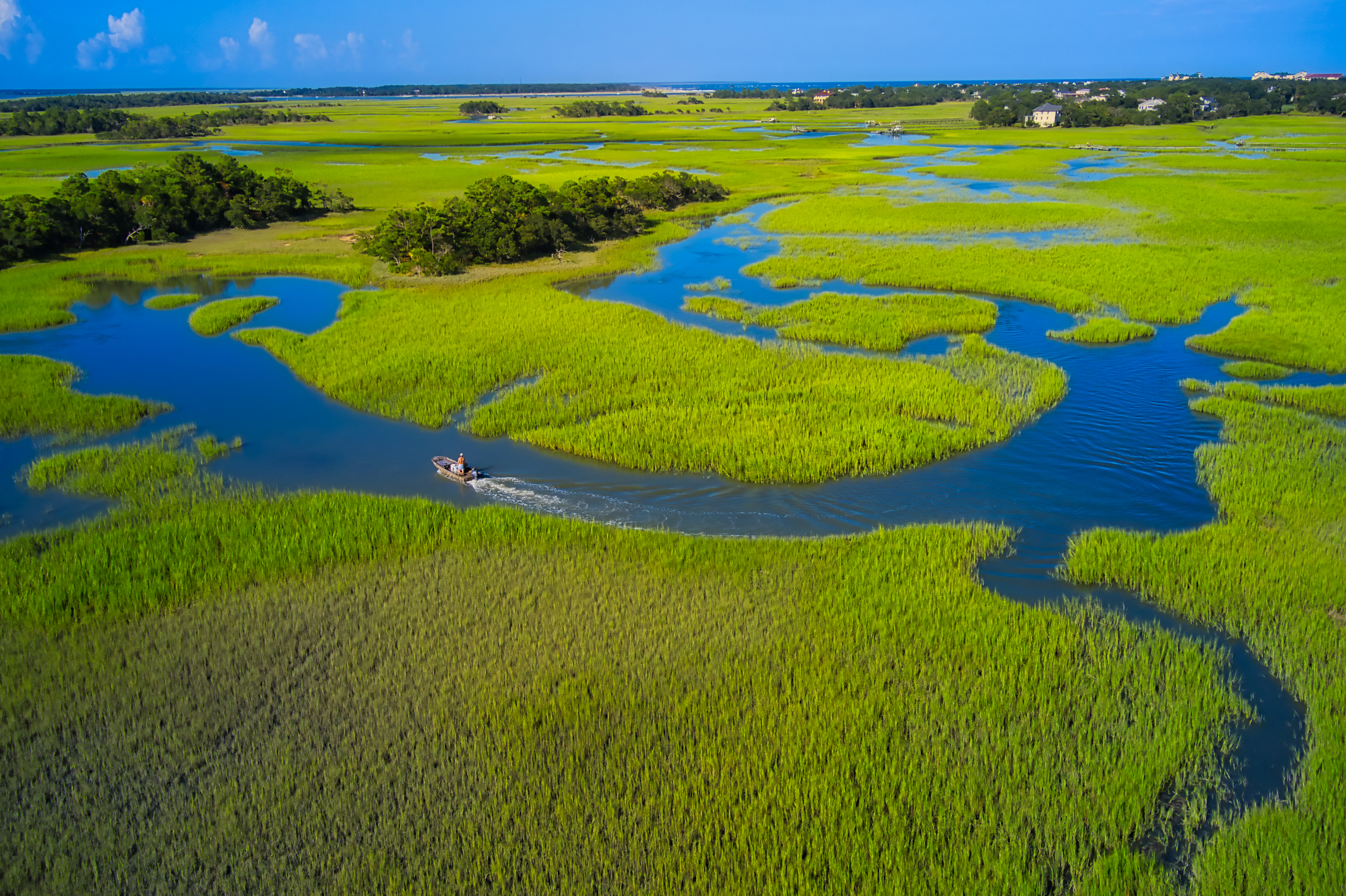 Picture of boat navigating in the marsh