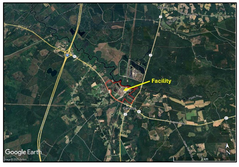 Satellite map showing a rural area with roads, fields, and forested land. A yellow arrow labeled “Facility” points to a site outlined in red near the community of Canays. Major highways and the Edisto River are visible in the surrounding landscape.